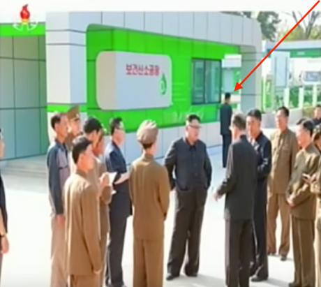 Kim Jong Un concluding his visit to the recently constructed Medical Oxygen Factory. Tagged in the photo is a member of Jong Un's close security escort (Photo: Korean Central Television)