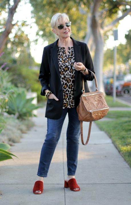 casual outfit with black jacket and leopard top