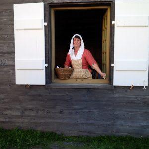 Cape Breton - Louisbourg Fortress - inside the fortress-city - servant selling baked goods 1