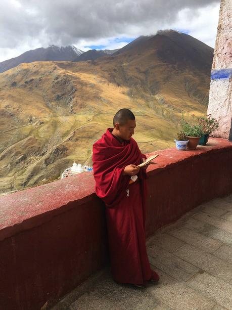 The Roof of the World: Why Travelling to Tibet Should Be On Your Bucket list! monk-in-the-mountains-tibet