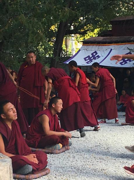 The Roof of the World: Why Travelling to Tibet Should Be On Your Bucket list! monks-debate-time-2