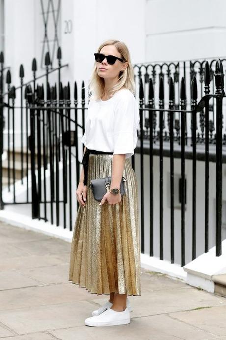 Jessie Bush Wears Pleated Gold Metallic Maxi Skirt With White Sneakers