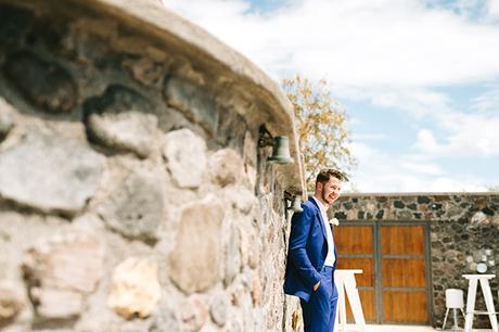 Colorful boho wedding in Santorini | Maxine & Lorenz groom-suit-summer-blue