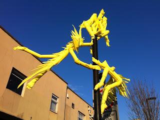 Yellow foam people – street art in Hornsey Road