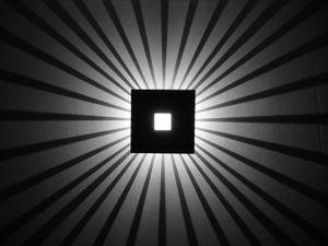 Wall-mounted light with shadows Wall-mounted light with shadows