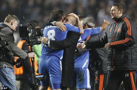 Party time: Chelsea manager Roberto Di Matteo celebrates with Frank Lampard after their win over Napoli