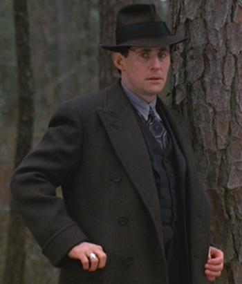 Tom’s Striped Charcoal Suit in Miller’s Crossing Tom’s Striped Charcoal Suit in Miller’s Crossing