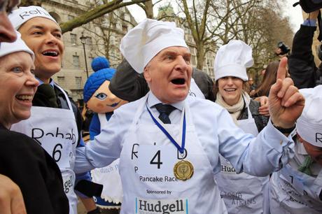 MPs and Lords Scramble into Action for the  20th Annual Rehab Parliamentary Pancake Race