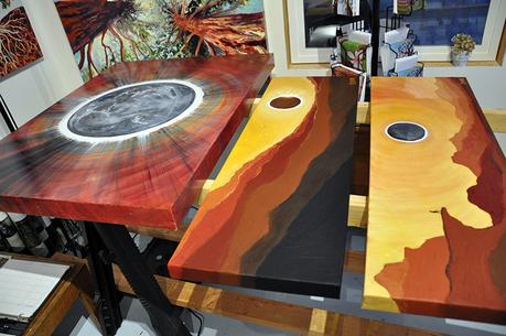 Eclipse paintings on drying rack in Cedar Lee art studio