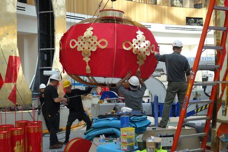 A Chinese lantern being positioned for Lunar New Year glory
