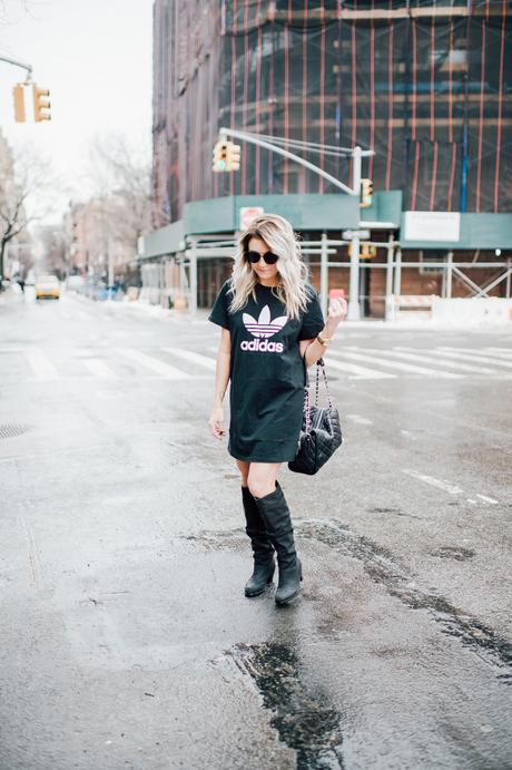 Adidas T-Shirt dress with high boots. Click through for more on how to wear a t-shirt dress. 
