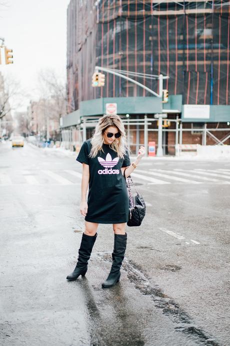 Adidas T-Shirt dress with high boots. Click through for more on how to wear a t-shirt dress. 