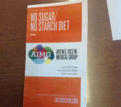 Physician Handing Out Diet Doctor-Inspired Low-Carb Pamphlets