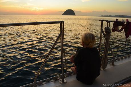 Happy boat kids, happy boat Siobhan watches sunset in Thailand