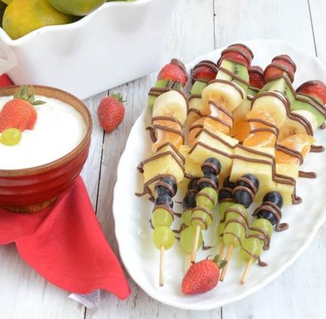Kids' appetites dip during the hot weather & understandably so! Give them refreshing nutrition with these healthy, cooling & colorful fruit skewers for summer!