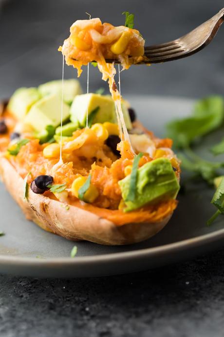 Enchilada Stuffed Sweet Potatoes that can go directly from the freezer into your oven! Make them ahead for an easy (vegetarian) meal prep lunch or dinner.