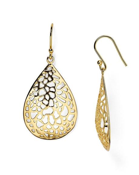 Bold earrings with open lace design will be lighter and more comfortable. Details at une femme d'un certain age.