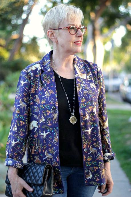 Outfit: Going Baroque details: Susan B. of une femme d'un certain age wears a J.Crew silk pajama top as a jacket, with a Chanel bag and French Kande jewelry