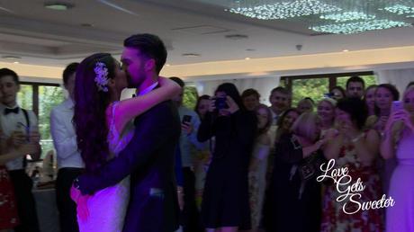 An Elegant and Stylish Lakes Wedding Video first dance on the sparkly dancefloor with pink lighting at armathwaite hall