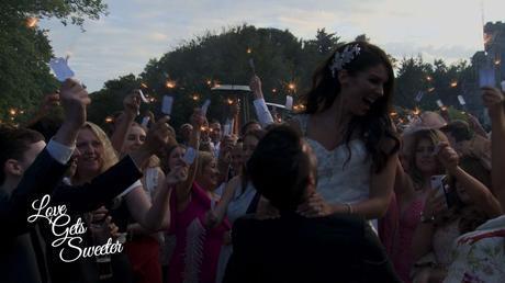 An Elegant and Stylish Lakes Wedding Video fun sparkler shot at dusk at armathwaite hall and the groom lifts the bride