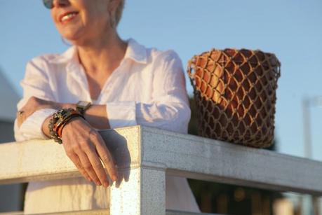 The Easy White Shirt details: Hermes leather wrap bracelet and French Kande bracelet worn by style bloger Susan B. of une femme d'un certain age