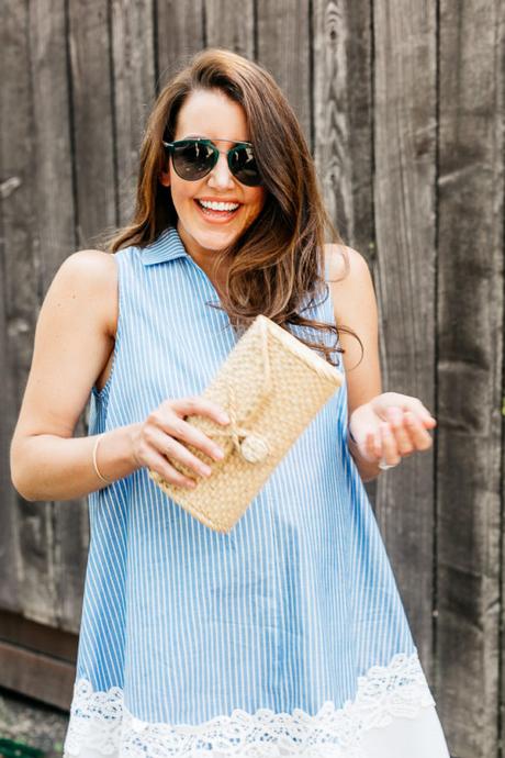 Amy Havins wears a blue and white striped shirtdress.
