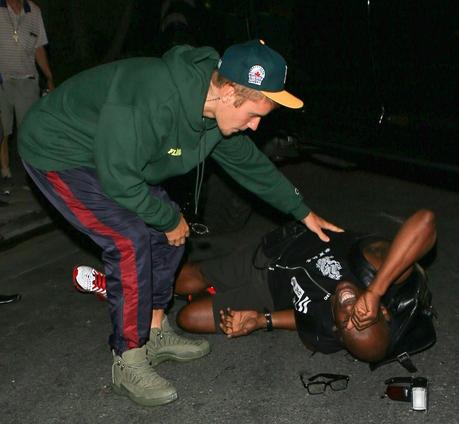 Justin Bieber backed into a paparazzo last night as he left a church event