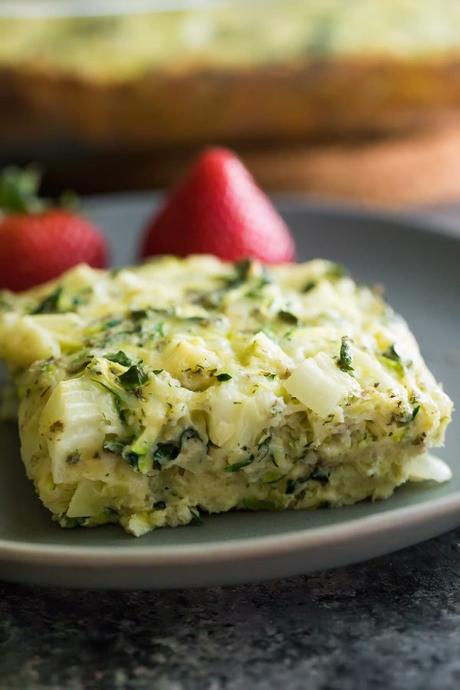 Herb zucchini & kale egg bake that you can make ahead and store in the fridge or freezer for a healthy meal prep breakfast on the go! Packed full of protein and veggies to give you a healthy start to your day.