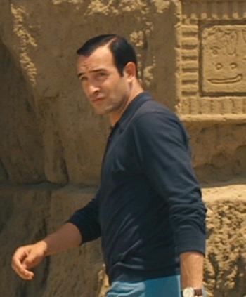 OSS 117’s Black Polo Shirt and Blue Trousers OSS 117’s Black Polo Shirt and Blue Trousers
