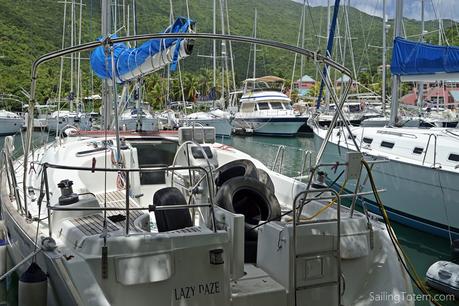 Weather resources for hurricane season Tortola, BVIs: car tires, aka hurricane fenders, in the cockpit at Nanny Cay