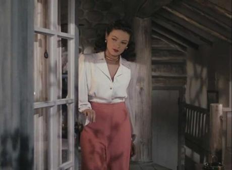 Gene Tierney Leave her to Heaven Gene Tierney - white-silk-blouse-and-high-waisted-wide-cut-coral-trousers 1945