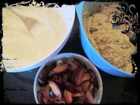 Flour mixture and cream cheese mixture in seperate bowls, and cut up plums in a third bowl.