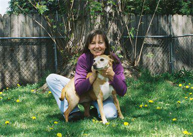 Deborah Pointer, animal communicator, and her dog Cinnamon: image via animalove.org