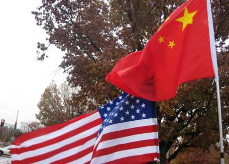 American and Chinese flags Chen Guangcheng blind activist escape raises stakes for US and China