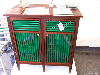 recycled garden hose cabinet Trash to Treasure: Re-Imagining Your Waste {Garden Hoses}