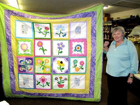 Ina and her quilt that took 18 months to make