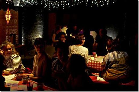 The audience drinks tea before The Hypocrites' Review: Romeo Juliet (The Hypocrites)