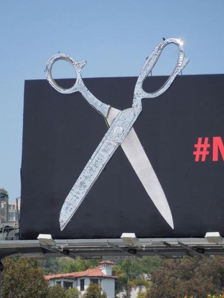 Project Runway #makeitwork glittering scissors billboard close-up Project Runway #makeitwork glittering scissors billboard close-up