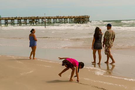 A THONG,  BEAUTIFUL GIRLS STANDING ON THEIR HEADS AND A DEAD BIRD!!! MUST BE DAYTONA