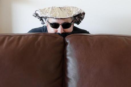 hiding behind the couch whilst wearing alfoil hat