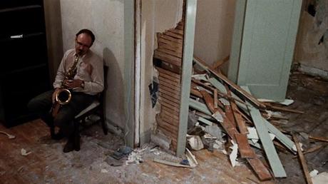 gene hackman playing saxophone in the movie the conversation