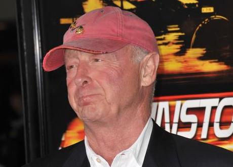 Director Tony Scott in his trademark red baseball cap. 