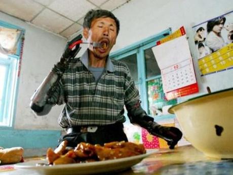 Chinese man builds his own bionic hands from scrap metal