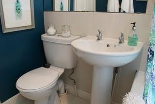 The Transformative Power of Paint: Peacock Blue Bathroom The Transformative Power of Paint: Peacock Blue Bathroom