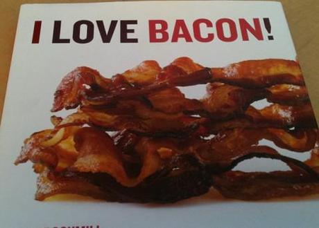 The dangers of loving bacon include high blood pressure...
