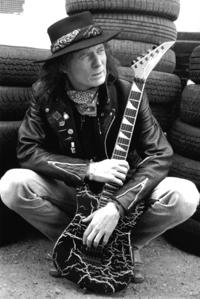 Bullet Belts and Bandanas – the story of one girl's obsession with Fast Eddie Clarke.