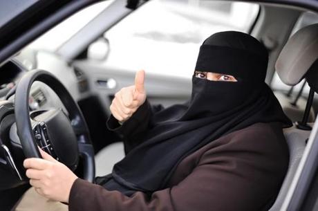 abu dhabi muslim green driver hijab woman