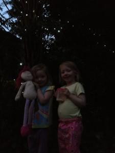 Julia, Dolly, and Lillian under the fairy lights