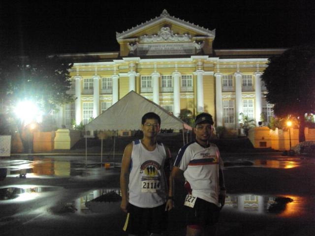 Me and Richard Pausing (New Running buddy) Race Report: Pangasinan Great Run Half Marathon 2012