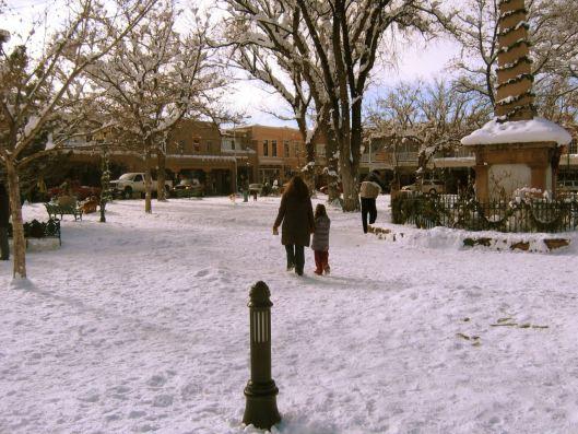 A walk across the snowy Santa Fe Plaza